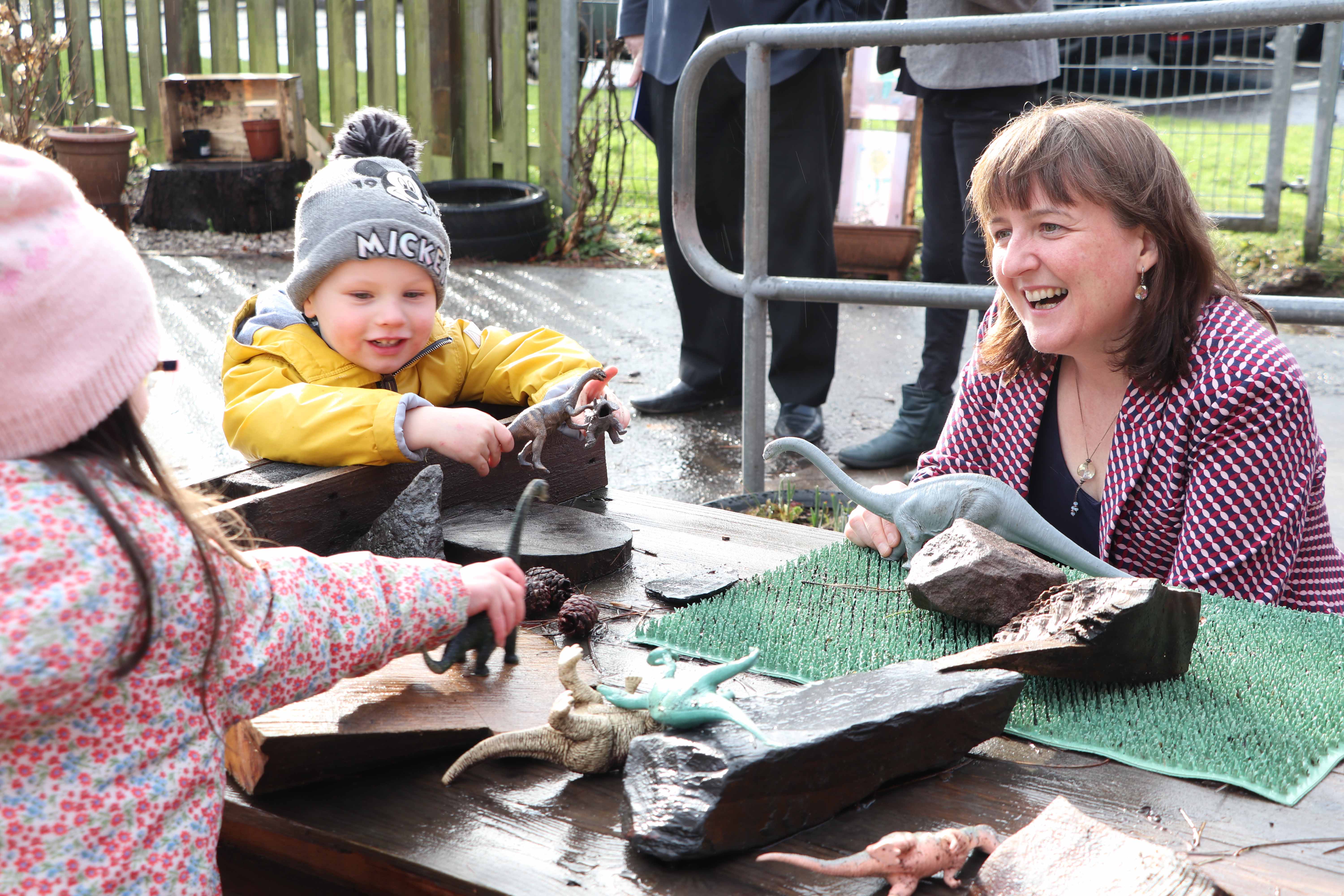 Minister meets nursery children in playground Minister meets nursery children in playground