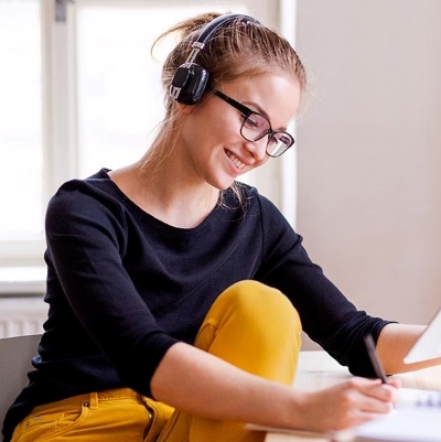 Student with earphones on Student with earphones on