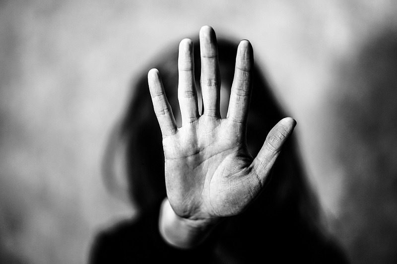 Palm of hand facing out Palm of hand facing out